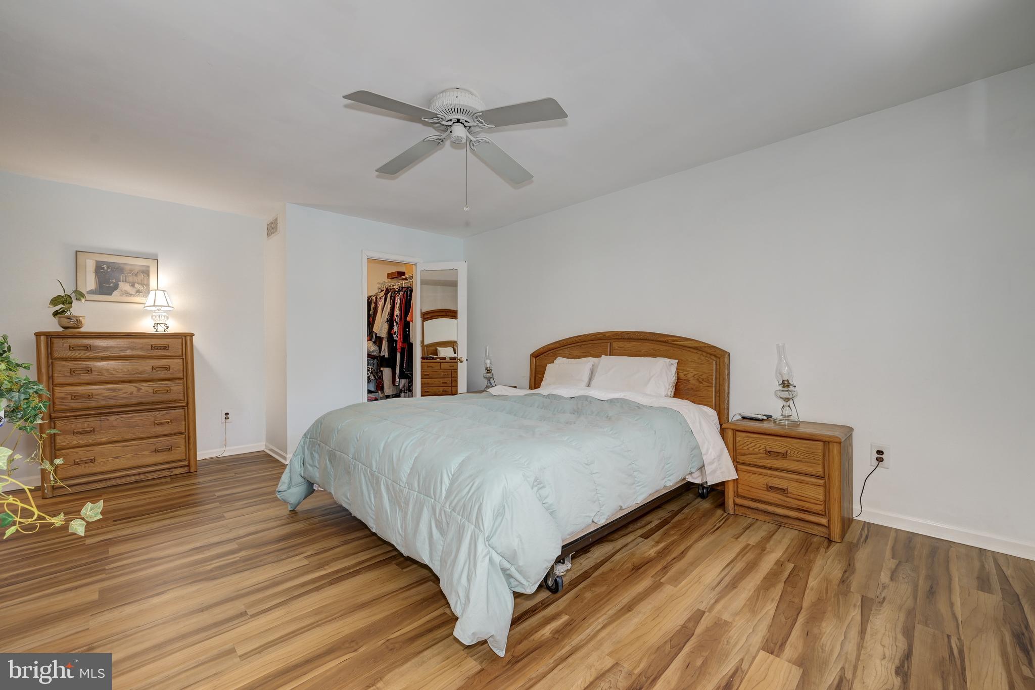 12 Friar Tuck Drive Medford, NJ 08055 - Photo 36 of 68 a bedroom with a bed and dresser