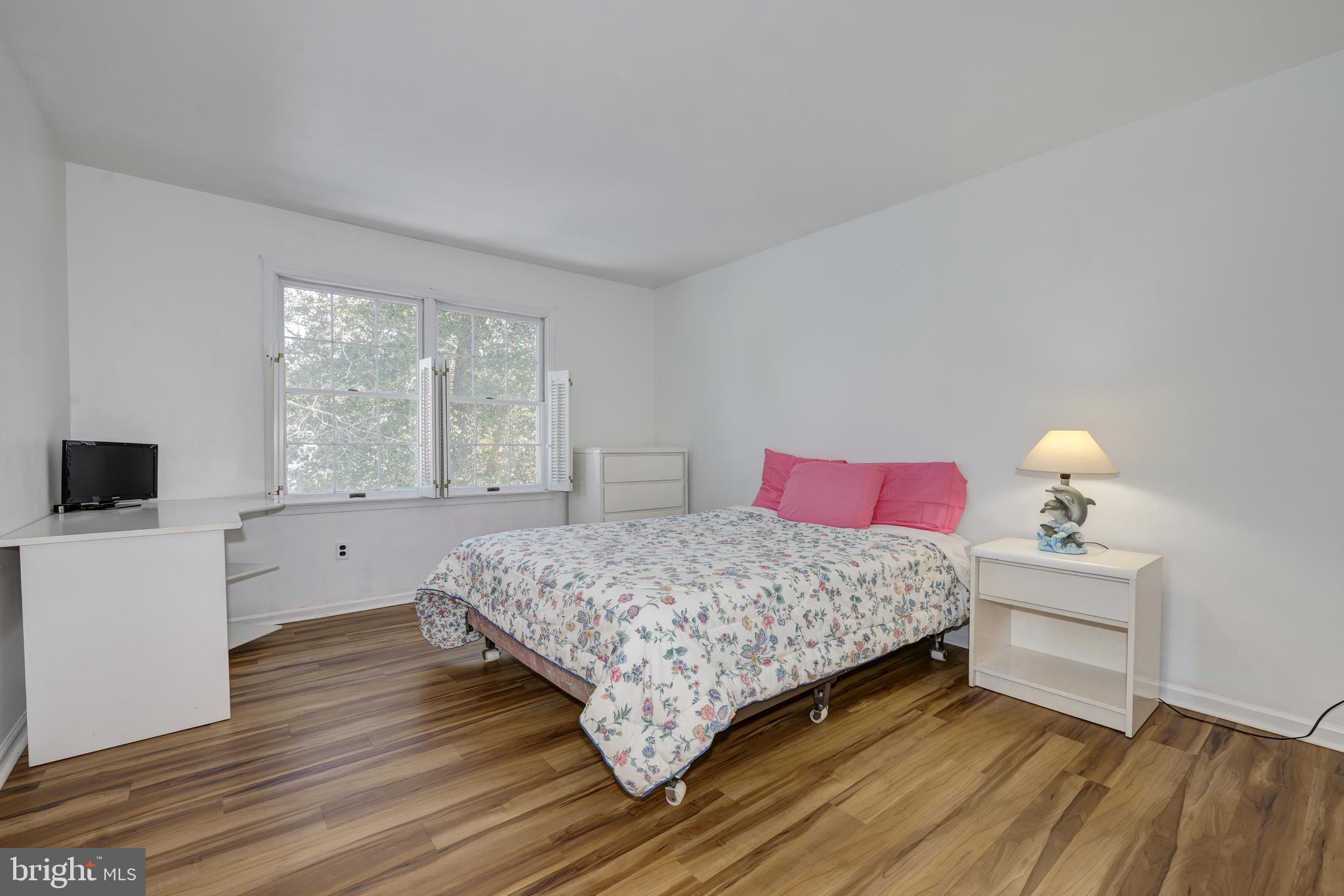 12 Friar Tuck Drive Medford, NJ 08055 - Photo 40 of 68 a bedroom with a bed and a window