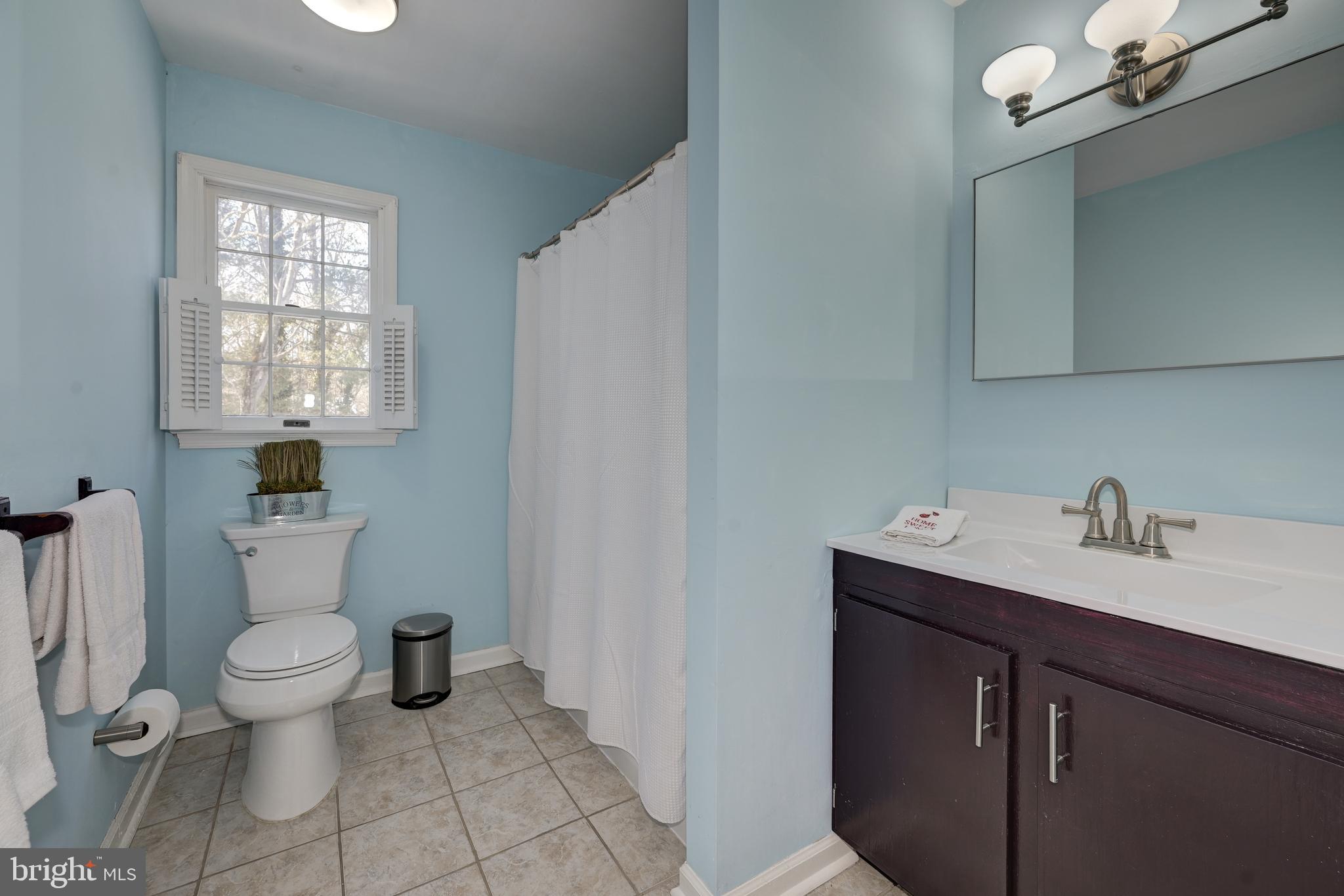 12 Friar Tuck Drive Medford, NJ 08055 - Photo 44 of 68 a bathroom with a sink toilet and a window