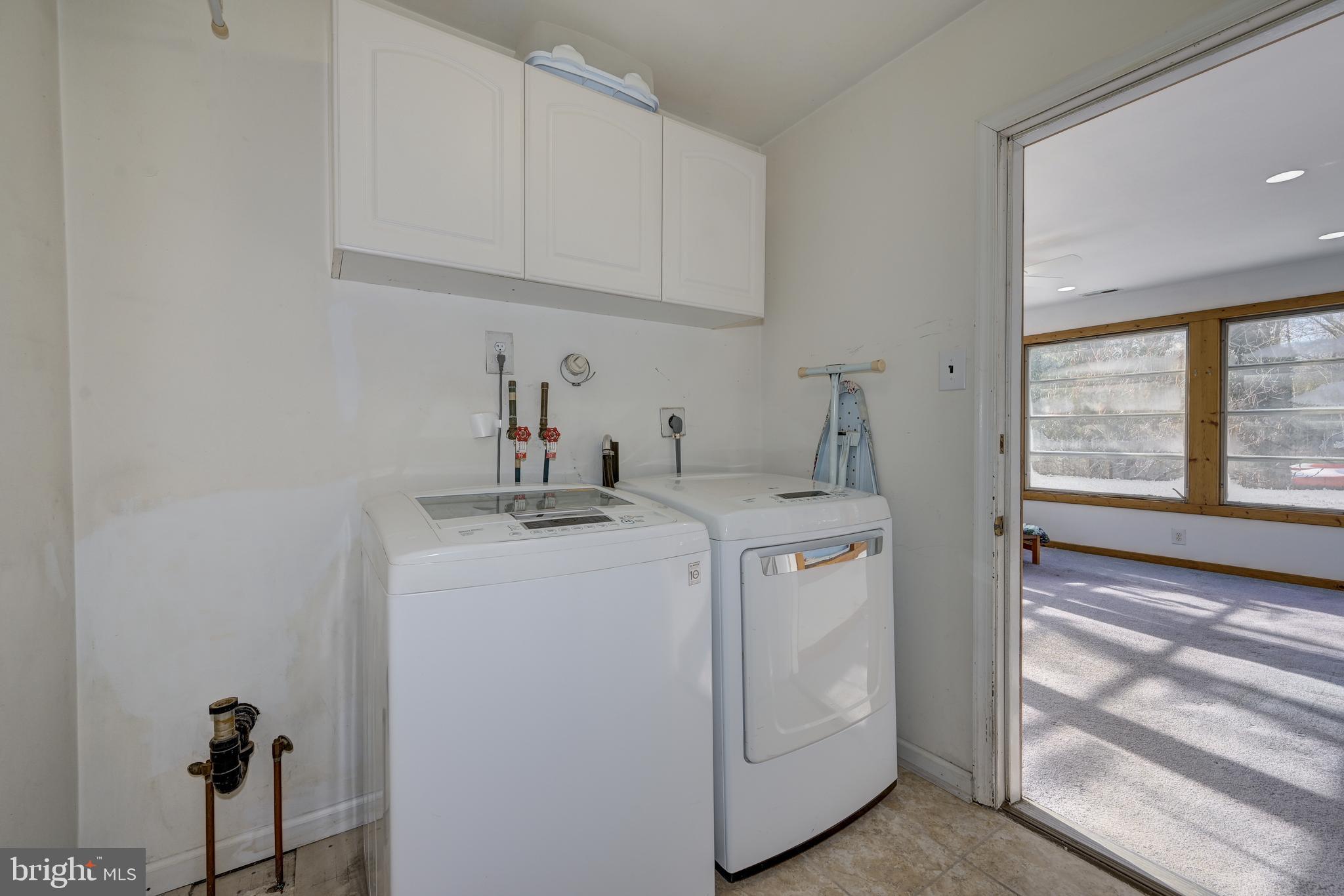 12 Friar Tuck Drive Medford, NJ 08055 - Photo 45 of 68 a utility room with sink dryer and washer