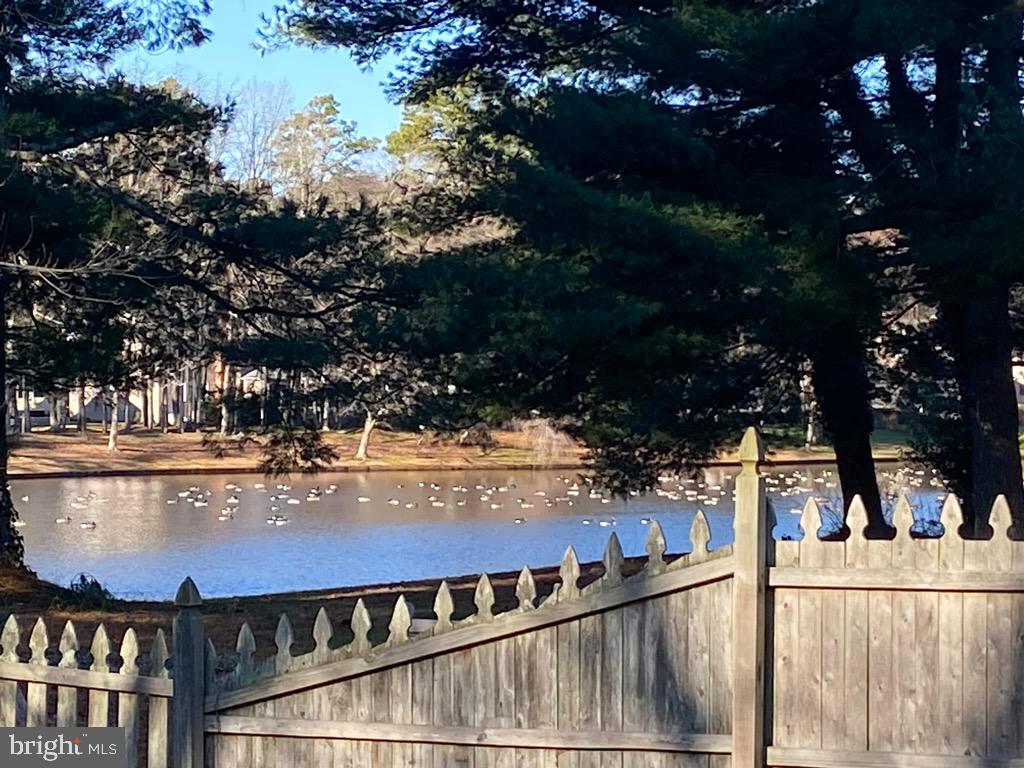 12 Friar Tuck Drive Medford, NJ 08055 - Photo 58 of 68 a view of a swimming pool with an outdoor seating and mountain view