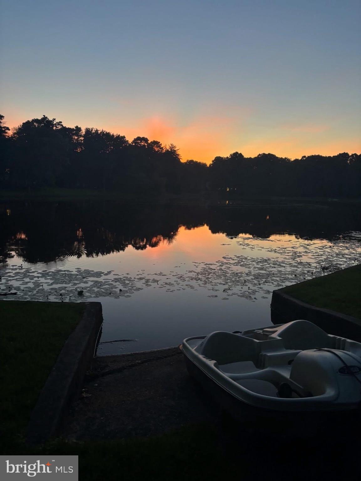 12 Friar Tuck Drive Medford, NJ 08055 - Photo 7 of 68 a view of a lake from a yard