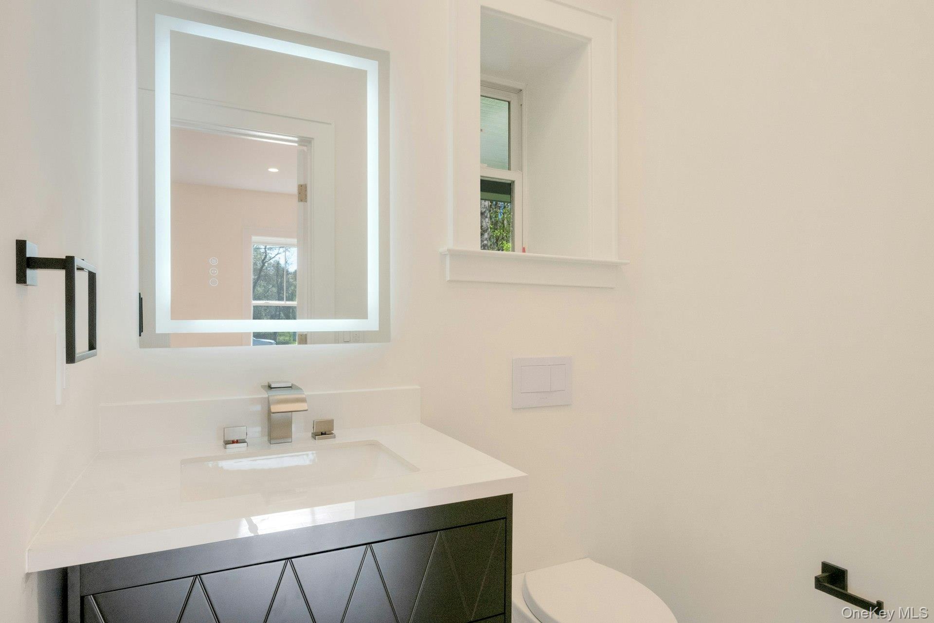 57 Meadow Sweet Road Cortlandt Manor, NY 10567 - Photo 15 of 49 Half bath on the first floor