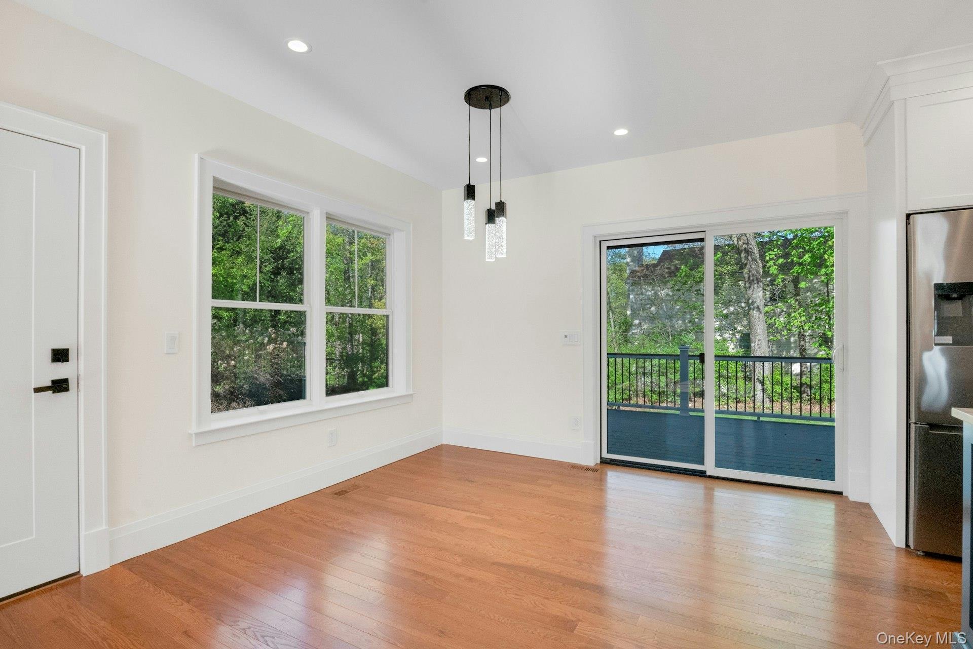 57 Meadow Sweet Road Cortlandt Manor, NY 10567 - Photo 10 of 49 Dining area with slider door out to oversized trex deck.