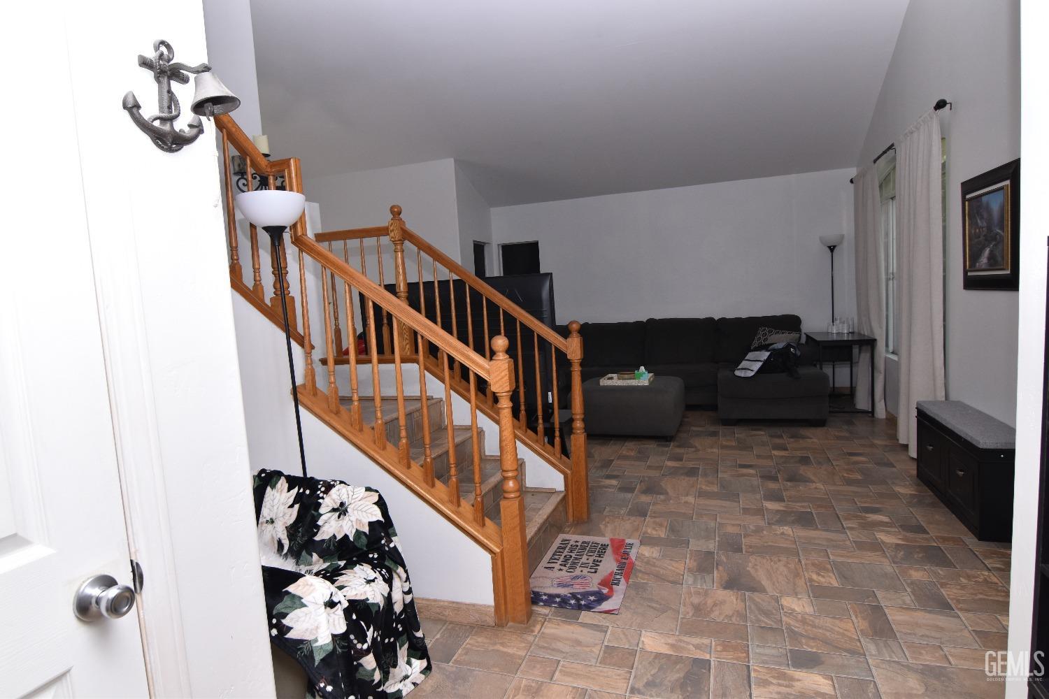 Undisclosed Address Bakersfield, CA 93313 - Photo 24 of 32 a view of entryway with wooden floor