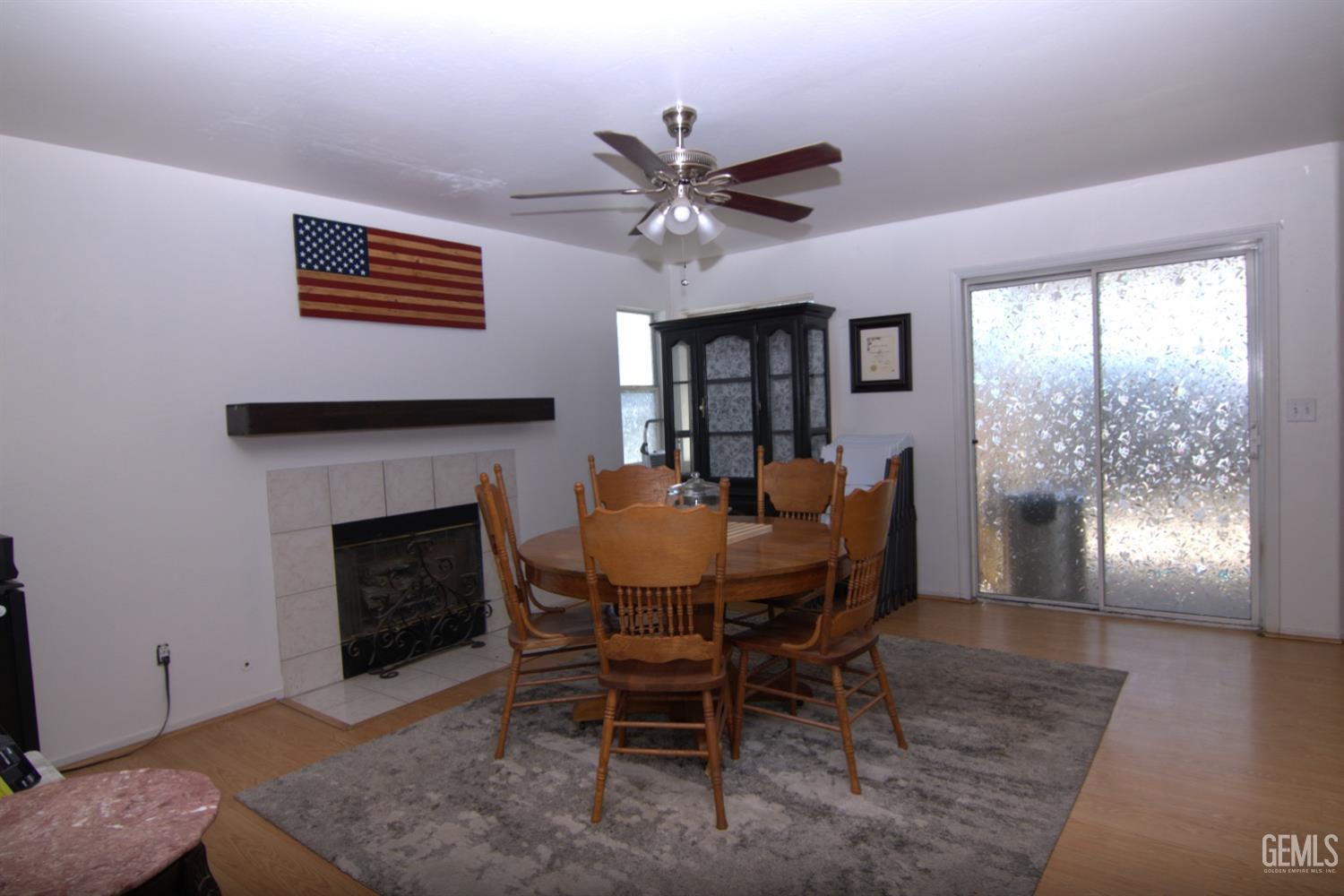 Undisclosed Address Bakersfield, CA 93313 - Photo 26 of 32 a view of a livingroom with furniture and a fireplace