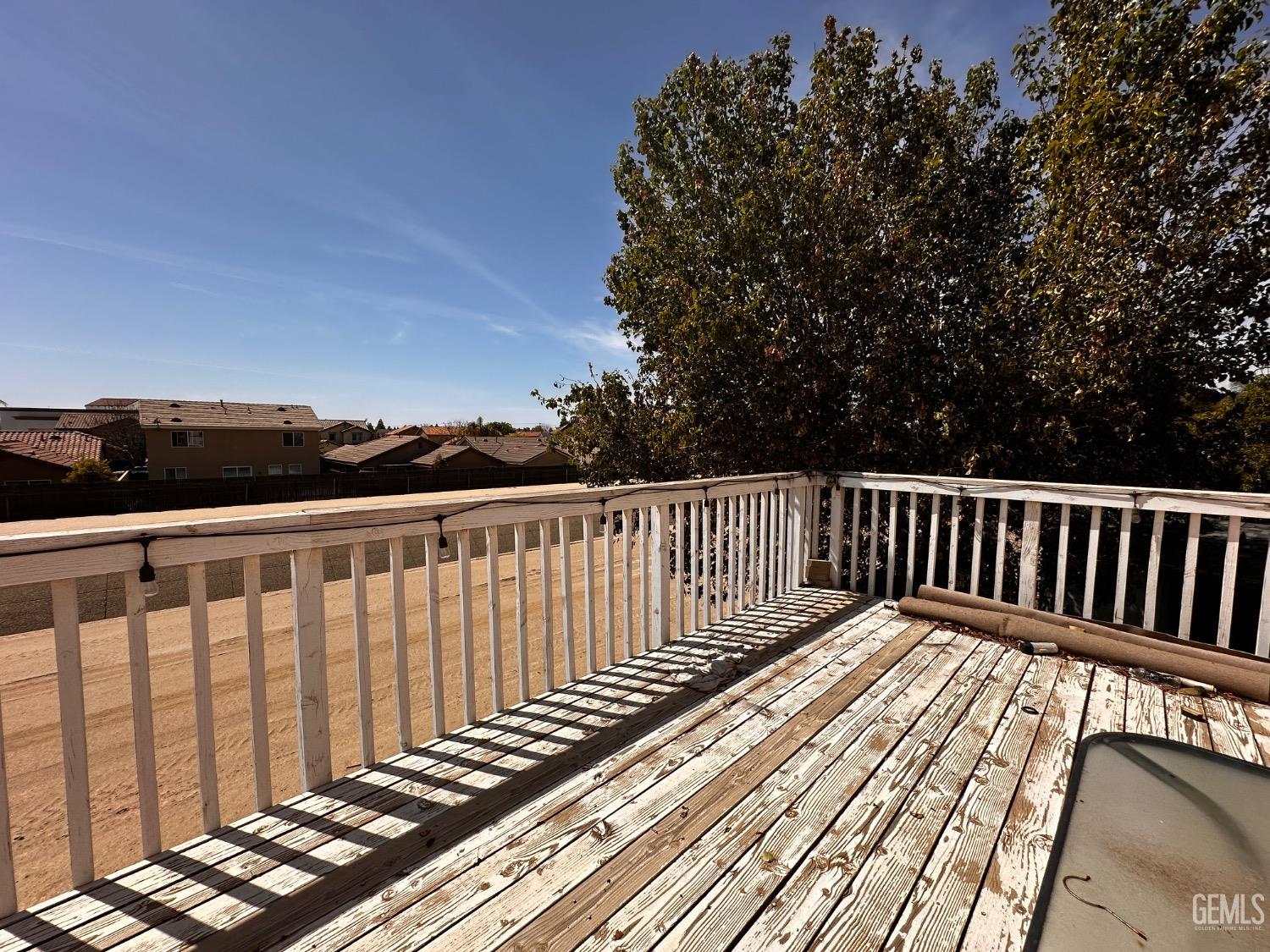 Undisclosed Address Bakersfield, CA 93313 - Photo 6 of 32 a view of balcony with wooden floor