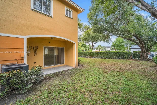 a front view of house with yard