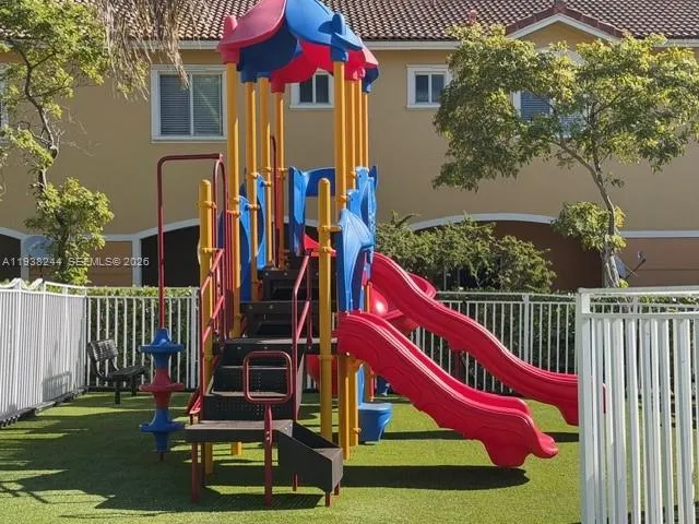 a view of front of house with a yard