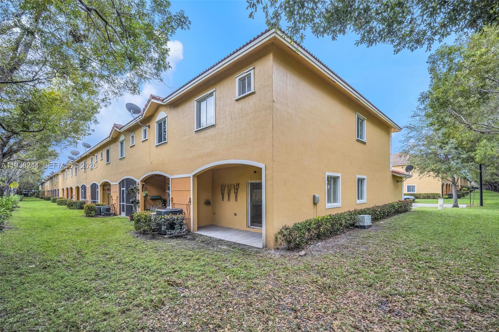 400 Princess Drive Margate, FL 33068 - Photo 2 of 26 a view of front of house with a yard