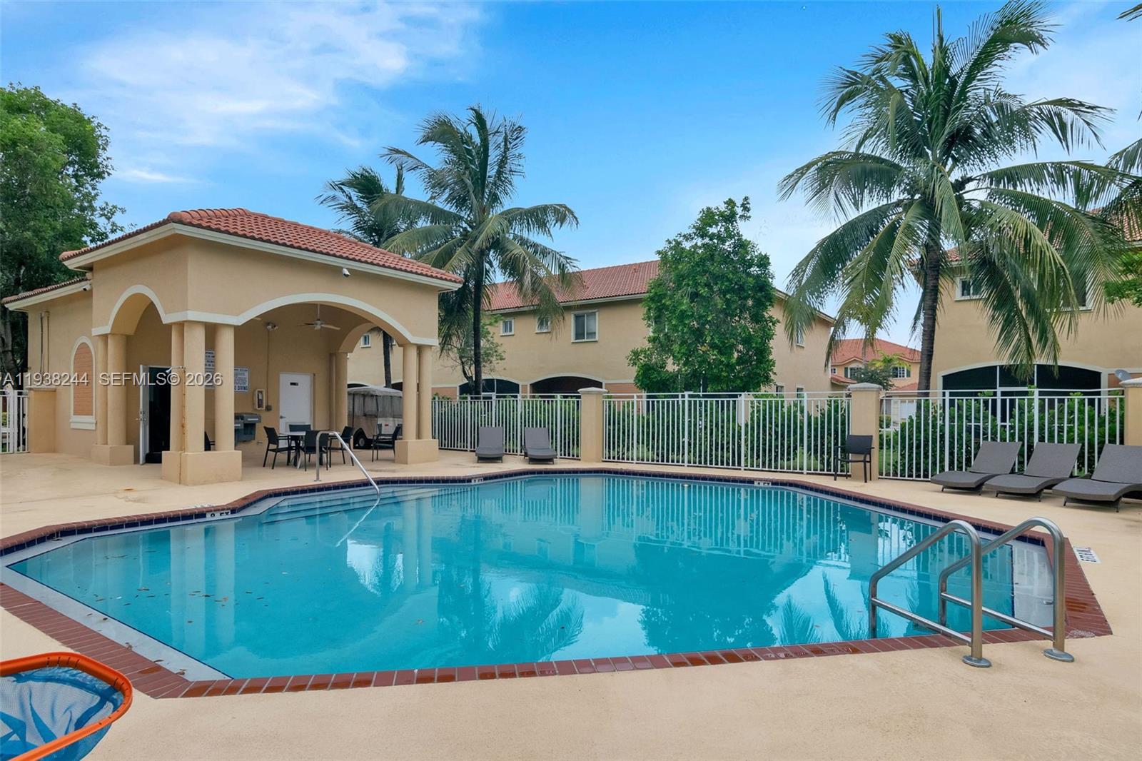 400 Princess Drive Margate, FL 33068 - Photo 26 of 26 a view of a house with pool and sitting area