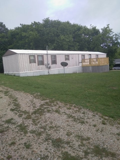 911 Ragsdale Lane Pulaski, TN 38478 - Photo 2 of 66 a view of a house with a backyard