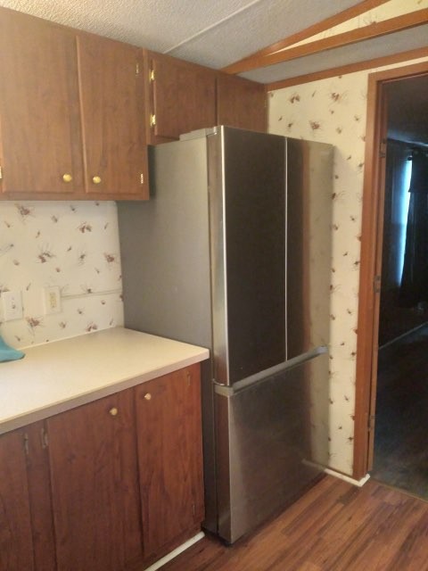 911 Ragsdale Lane Pulaski, TN 38478 - Photo 29 of 66 a kitchen with stainless steel appliances a refrigerator and a stove top oven