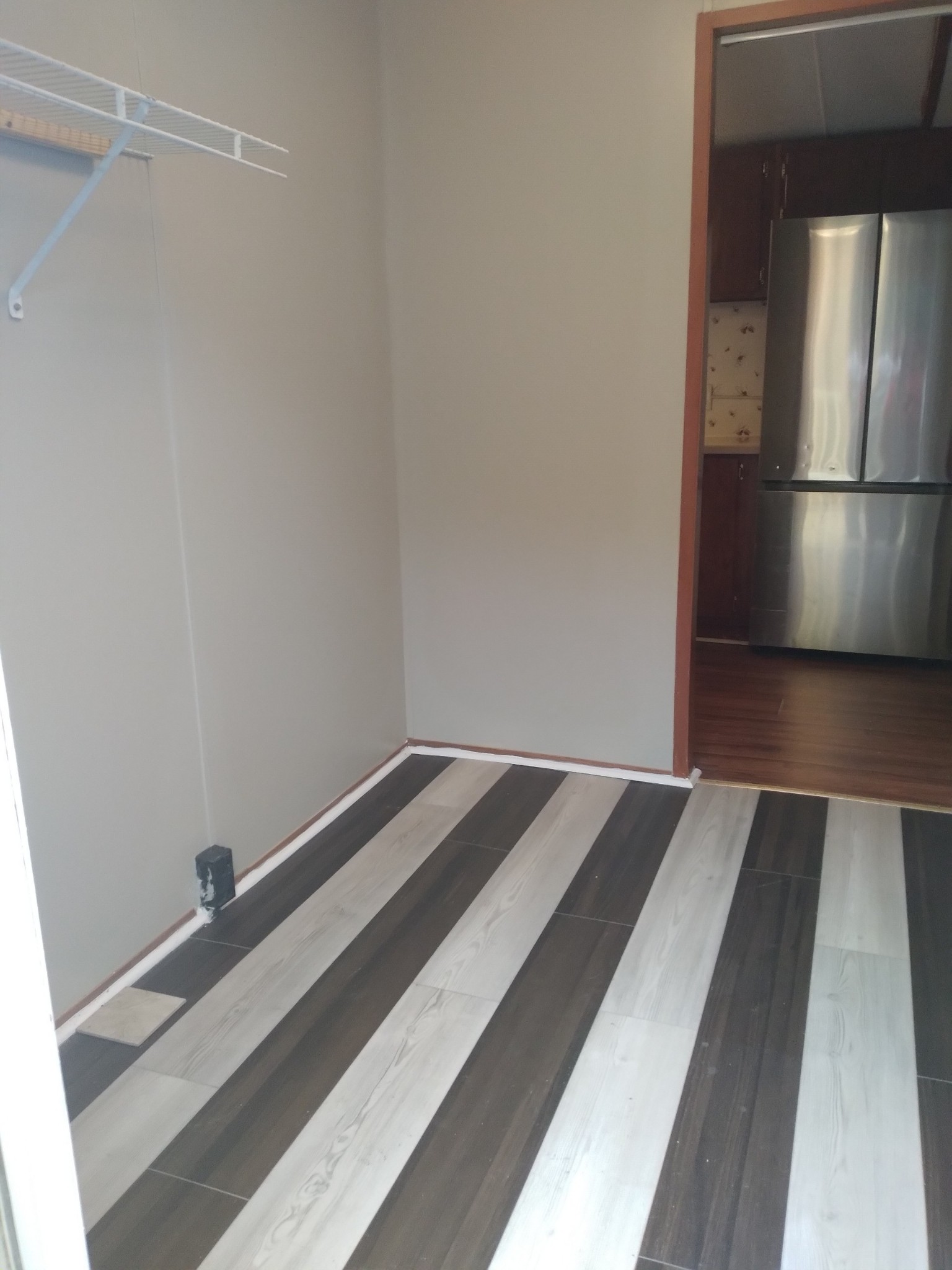 911 Ragsdale Lane Pulaski, TN 38478 - Photo 33 of 66 a bedroom with a bed and a refrigerator