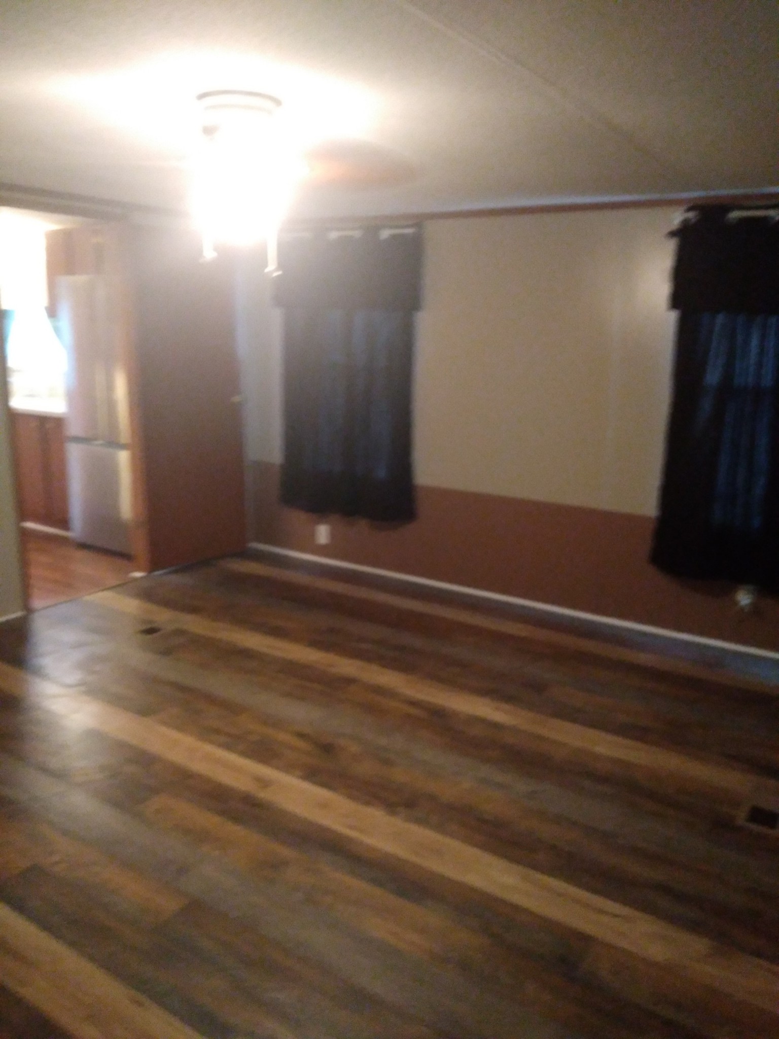 911 Ragsdale Lane Pulaski, TN 38478 - Photo 37 of 66 an empty room with wooden floor
