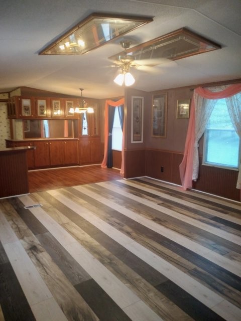 911 Ragsdale Lane Pulaski, TN 38478 - Photo 9 of 66 a bedroom with a bed and a large mirror