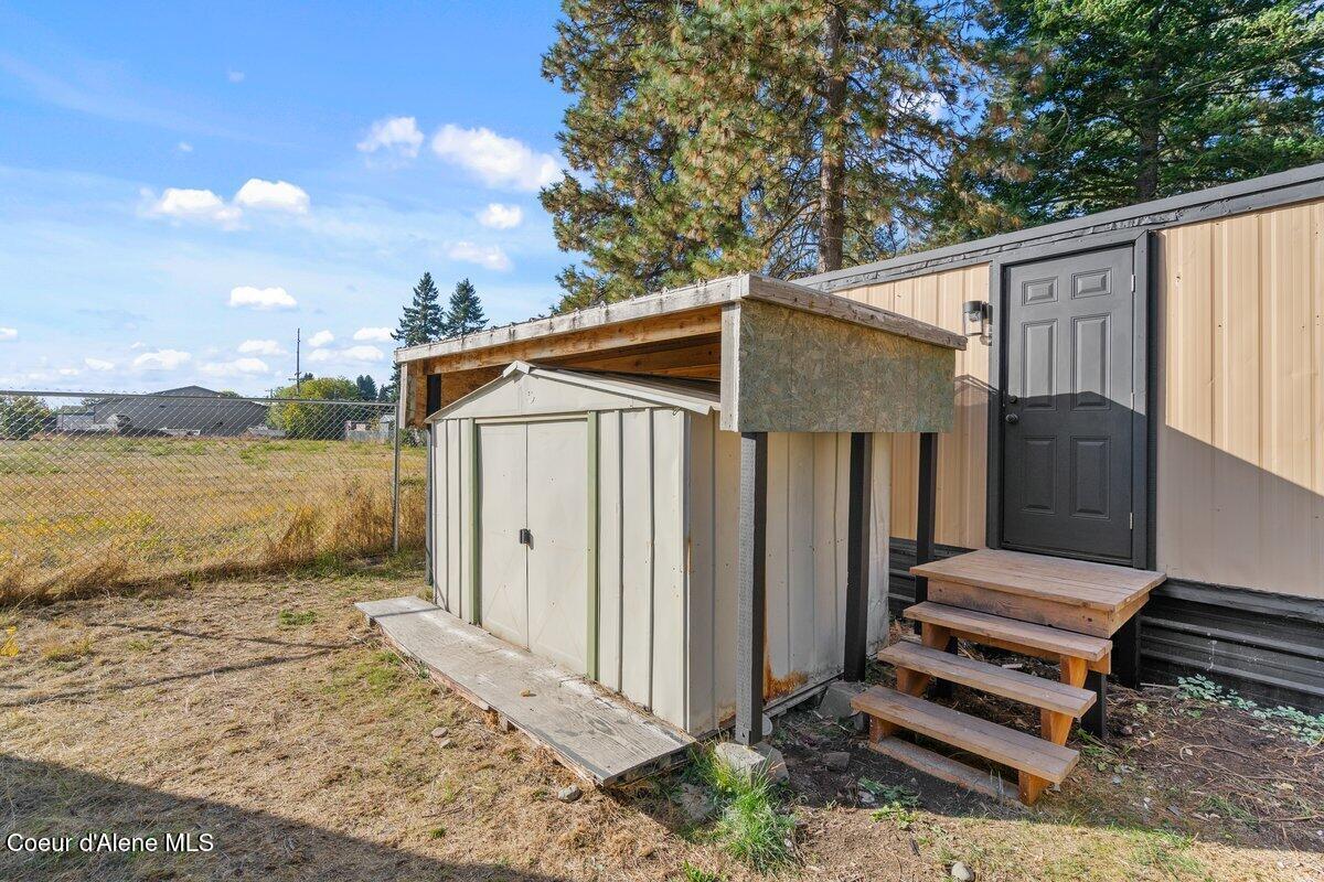 162 Stratus Lane Coeur D'Alene, ID 83815 - Photo 19 of 21 Shed and back of home