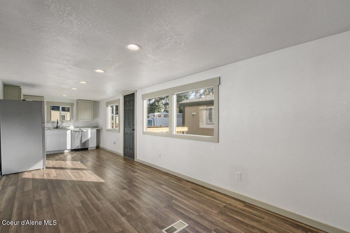 162 Stratus Lane Coeur D'Alene, ID 83815 - Photo 9 of 21 Living Room and Kitchen 2