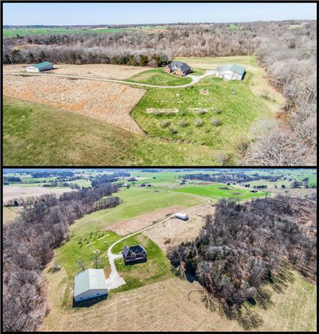 5108 Drake Road Cedar Hill, TN 37032 - Photo 2 of 20 Custom home with two metal buildings located in park-like setting including orchard, creeks and wooded area.