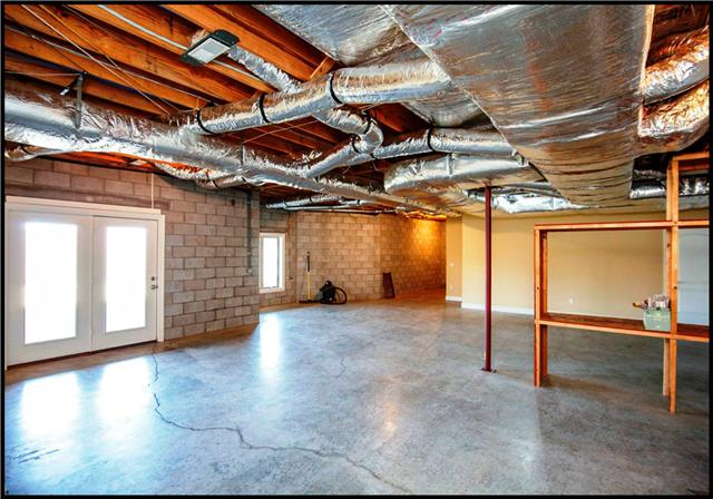5108 Drake Road Cedar Hill, TN 37032 - Photo 12 of 20 Unfinished area of basement for storage or finishing. Entire basement is heated and cooled.