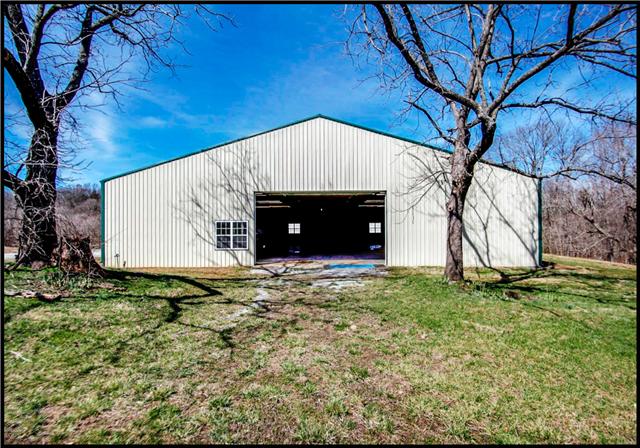 5108 Drake Road Cedar Hill, TN 37032 - Photo 17 of 20 5.5 ft tall main entrance to the primary metal building . Reinforced flooring permits storage of buses, RVs, boats and heavy machinery.