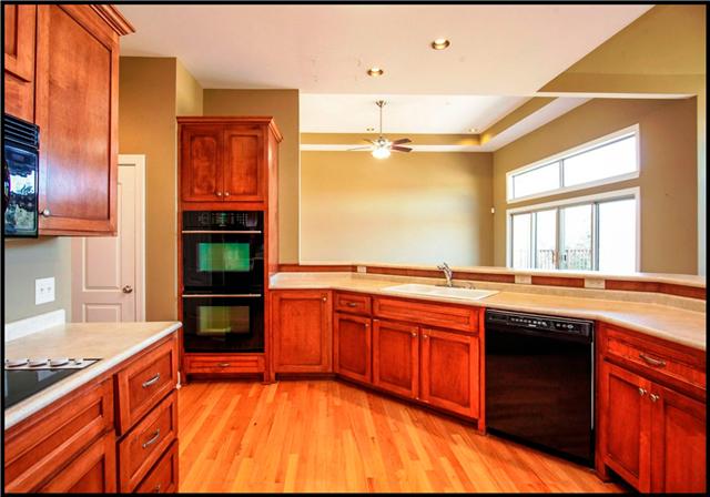 5108 Drake Road Cedar Hill, TN 37032 - Photo 6 of 20 Kitchen view into living room. Large countertops provide generous workspace.