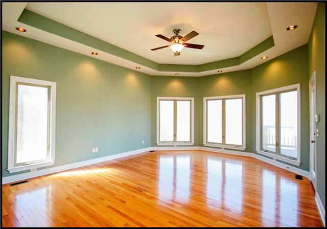 5108 Drake Road Cedar Hill, TN 37032 - Photo 8 of 20 Bright master bedroom features a trayed ceiling, large walk-in closet and direct access to the deck.