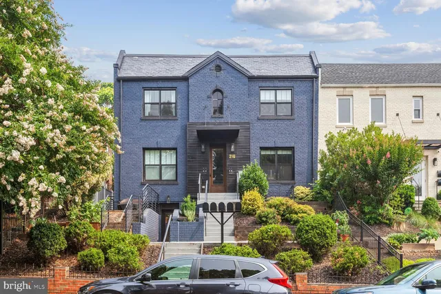 front view of house with a tree