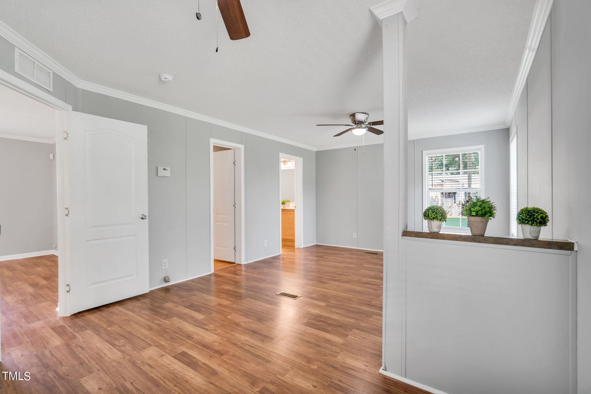 4711 Wheels Hill Road Durham, NC 27705 - Photo 33 of 67 Primary bed sitting area
