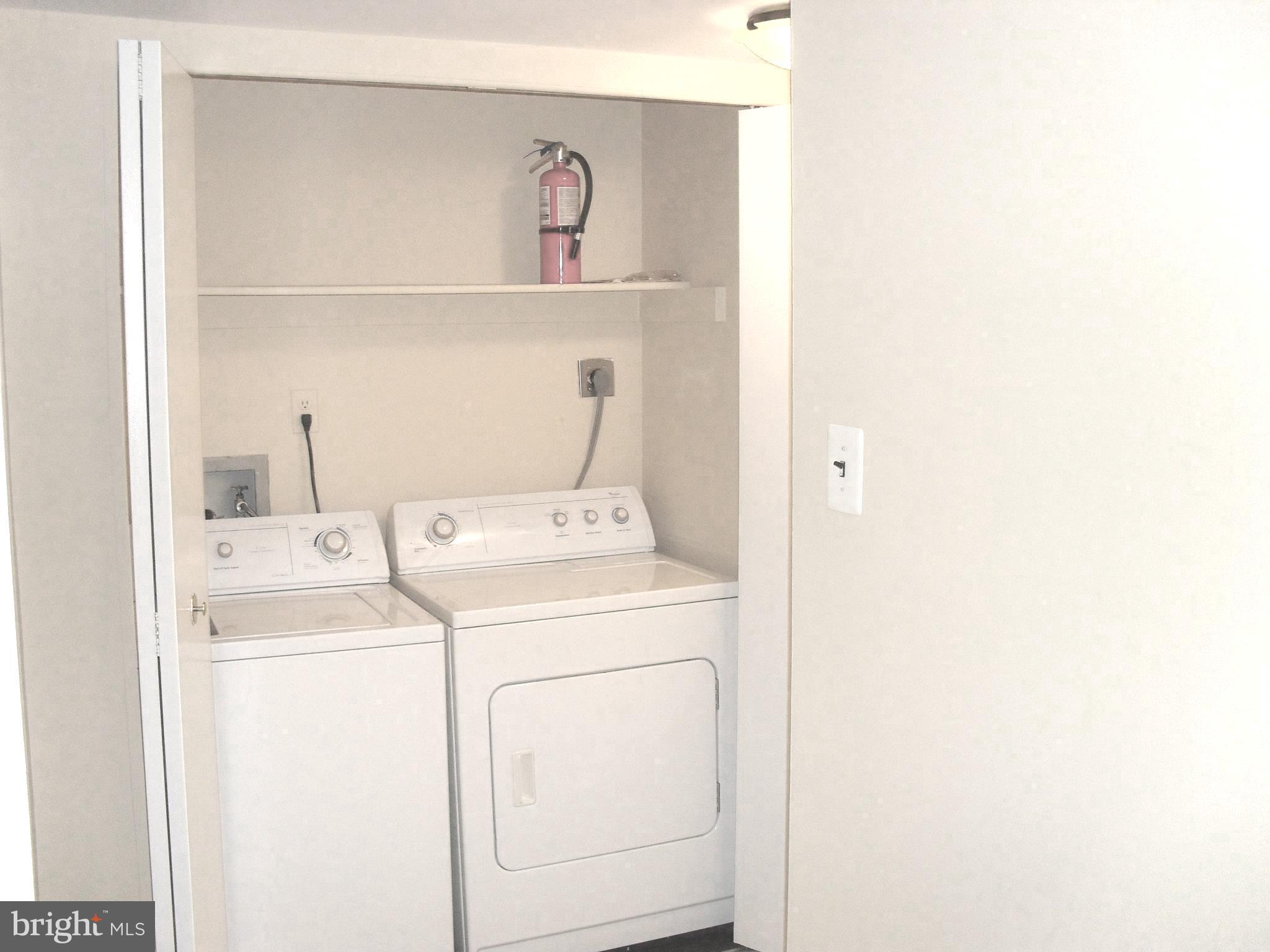 1659 Parkcrest Circle, Unit C Reston, VA 20190 - Photo 26 of 31 a utility room with dryer and washer