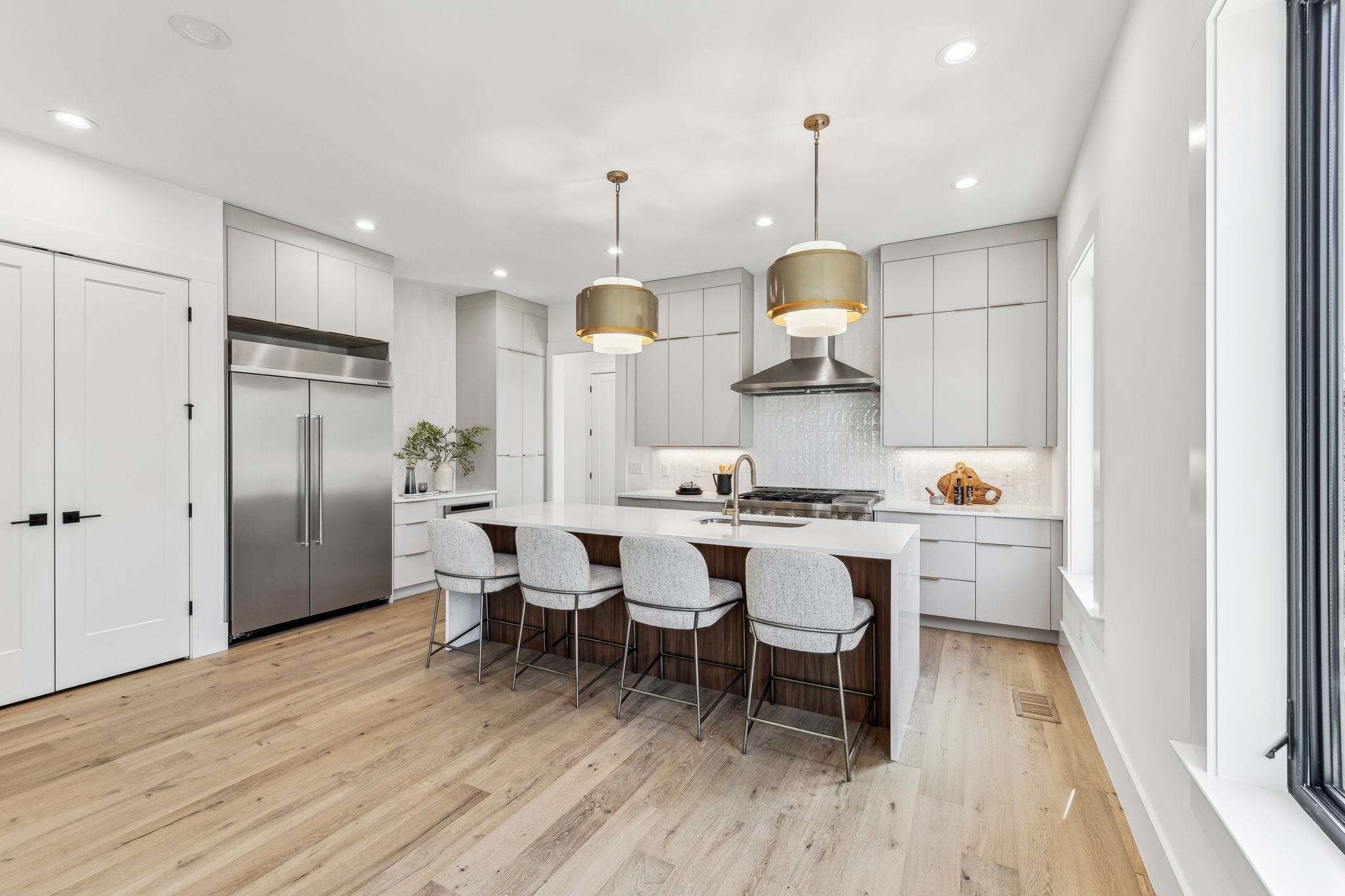 3135 Parthenon Avenue, Unit A Nashville, TN 37203 - Photo 12 of 77 a living room with stainless steel appliances granite countertop furniture wooden floor and a view of kitchen