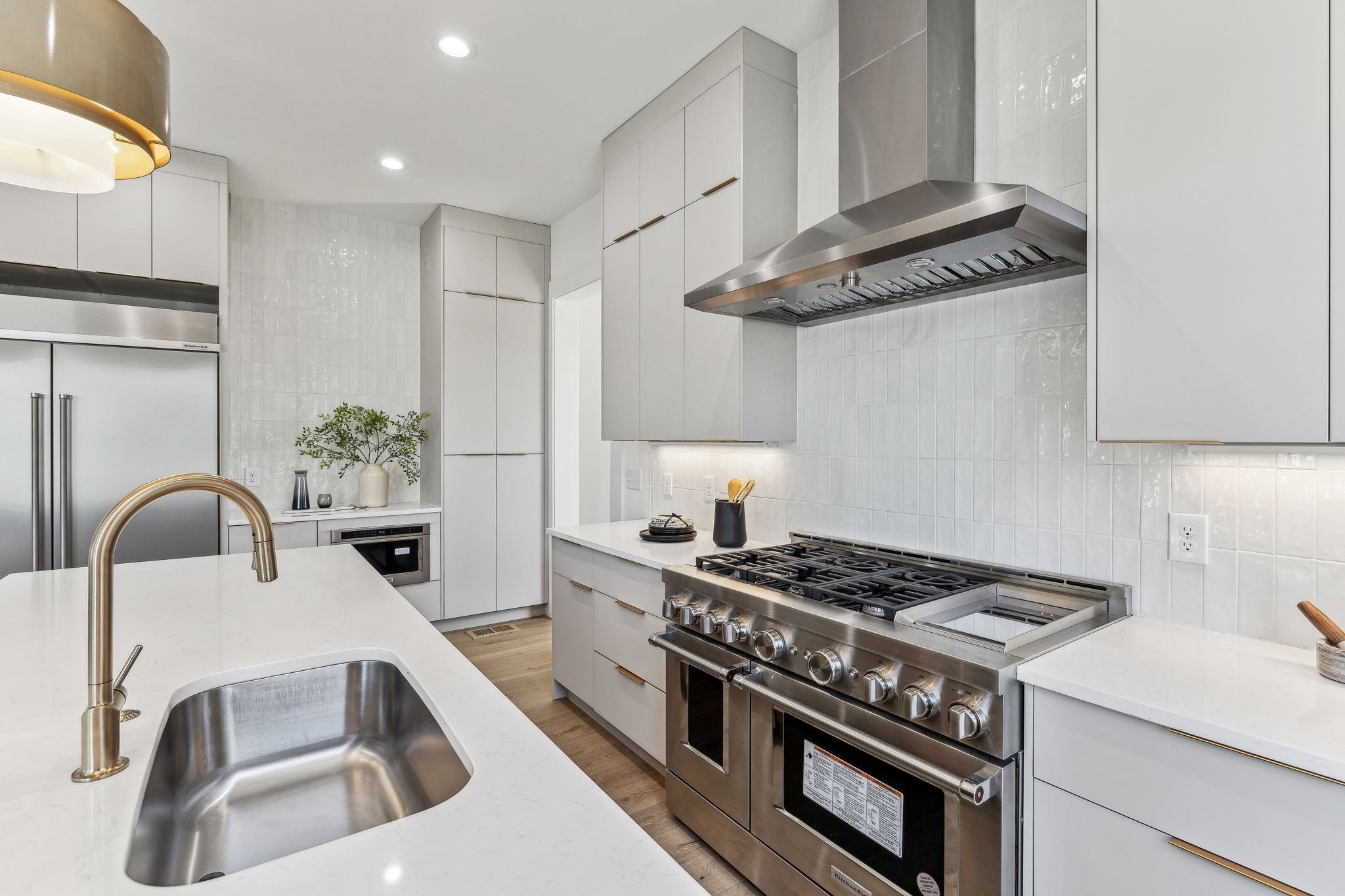 3135 Parthenon Avenue, Unit A Nashville, TN 37203 - Photo 18 of 77 a kitchen with granite countertop a sink stainless steel appliances and cabinets