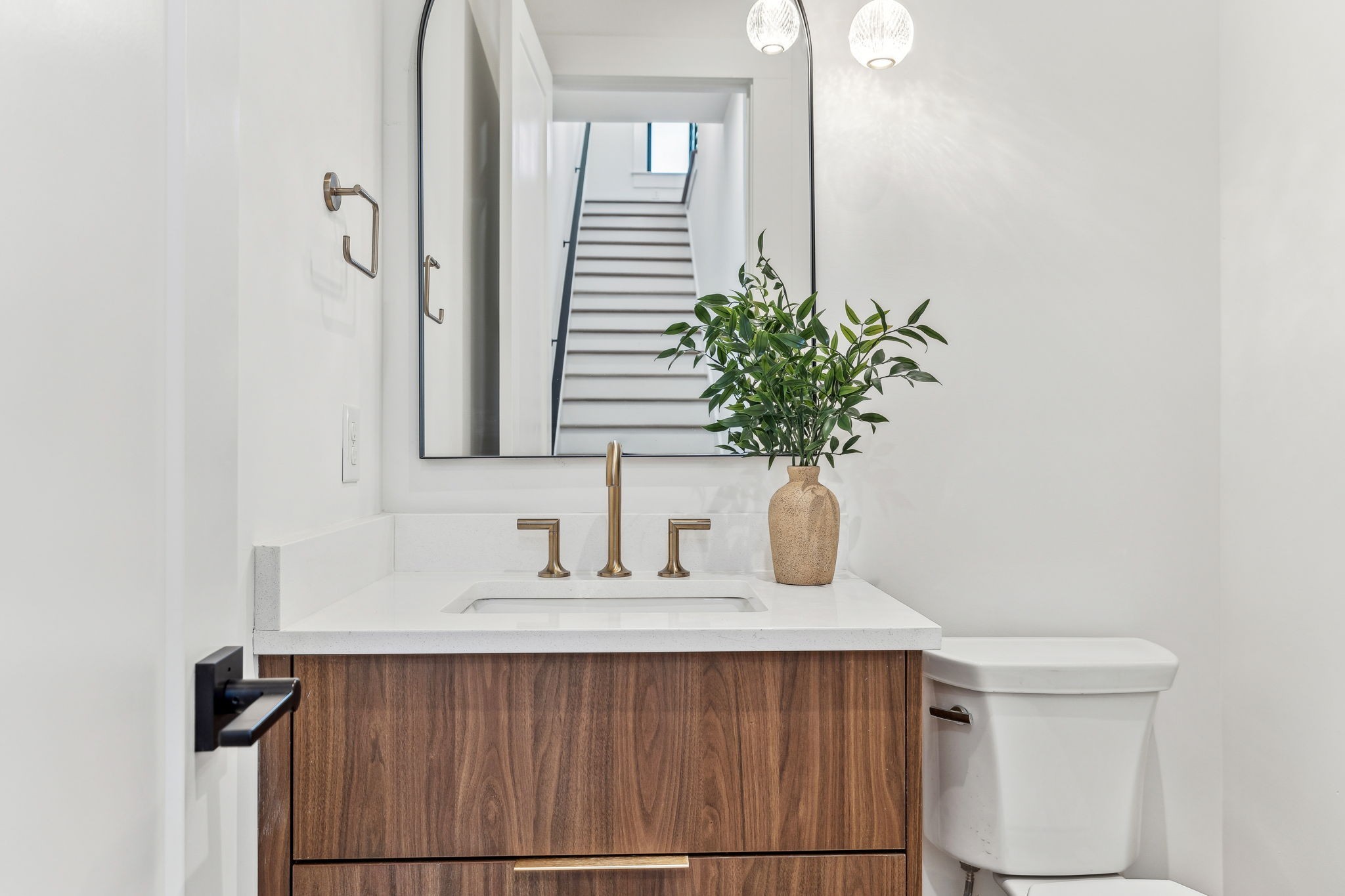 3135 Parthenon Avenue, Unit A Nashville, TN 37203 - Photo 20 of 77 a bathroom with a sink a mirror and vanity