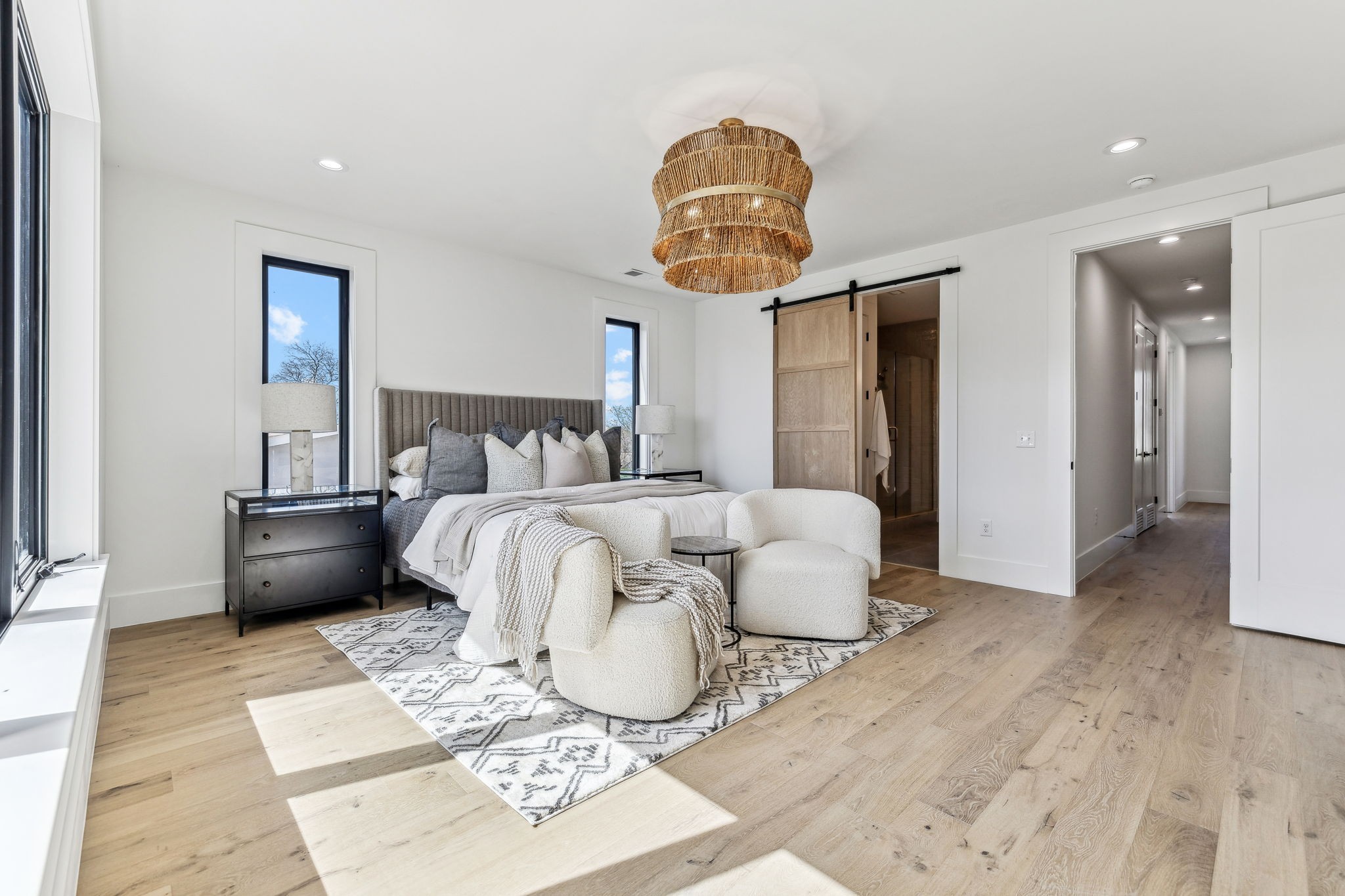 3135 Parthenon Avenue, Unit A Nashville, TN 37203 - Photo 22 of 77 a bedroom with a bed and a chandelier