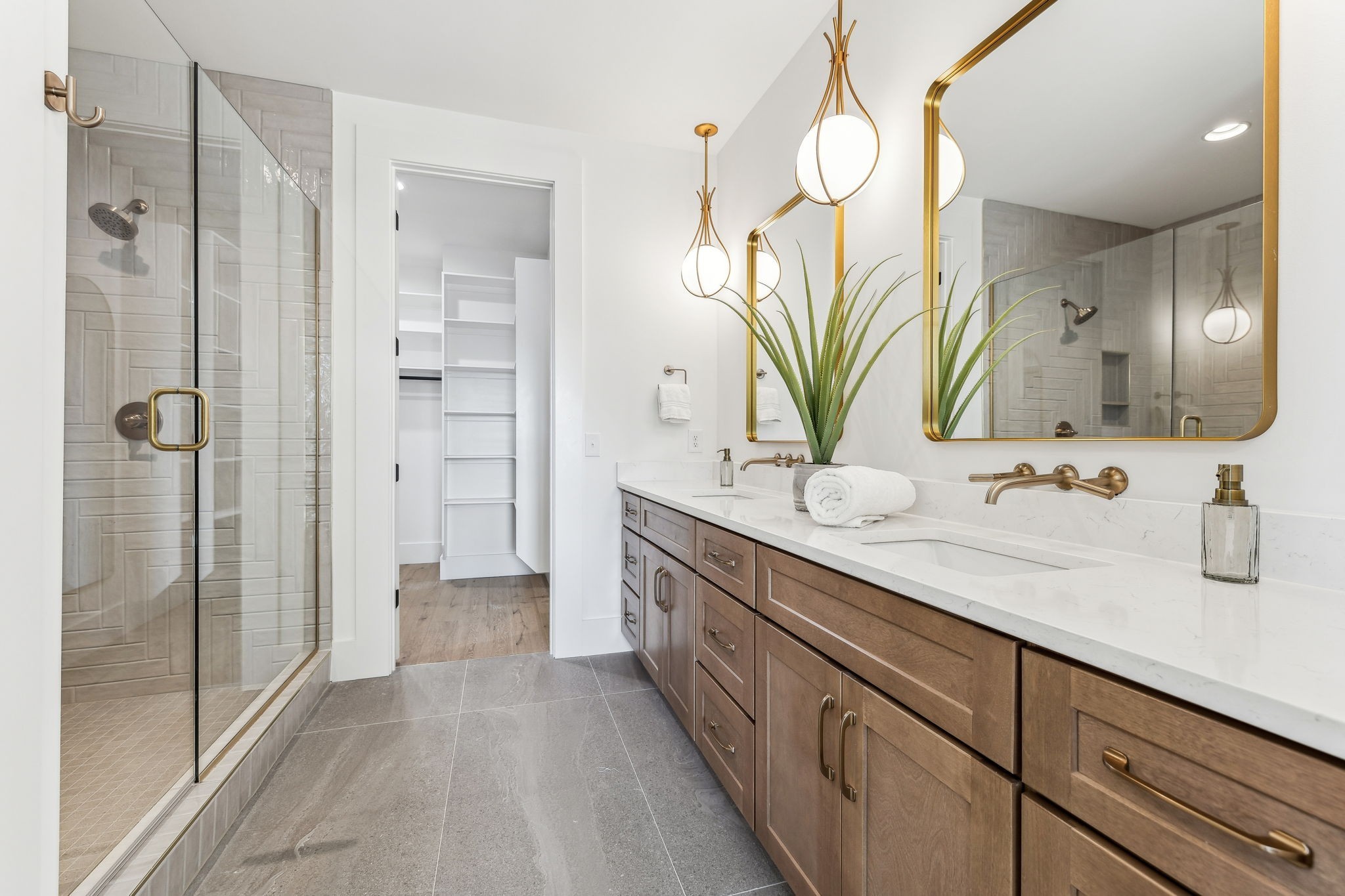 3135 Parthenon Avenue, Unit A Nashville, TN 37203 - Photo 25 of 77 a bathroom with a double vanity sink mirror and shower