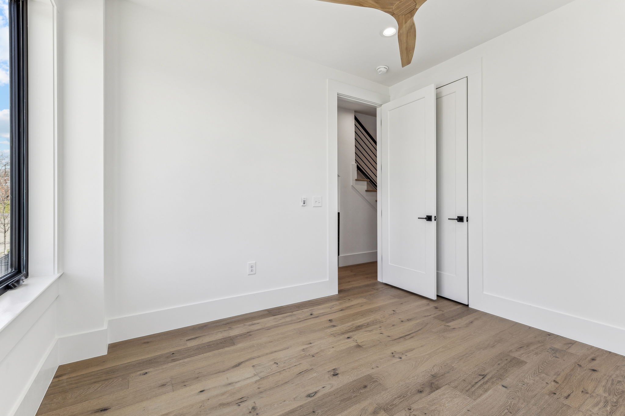 3135 Parthenon Avenue, Unit A Nashville, TN 37203 - Photo 30 of 77 a view of an empty room with wooden floor