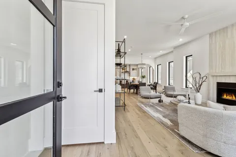 a view of a livingroom with furniture and a fireplace
