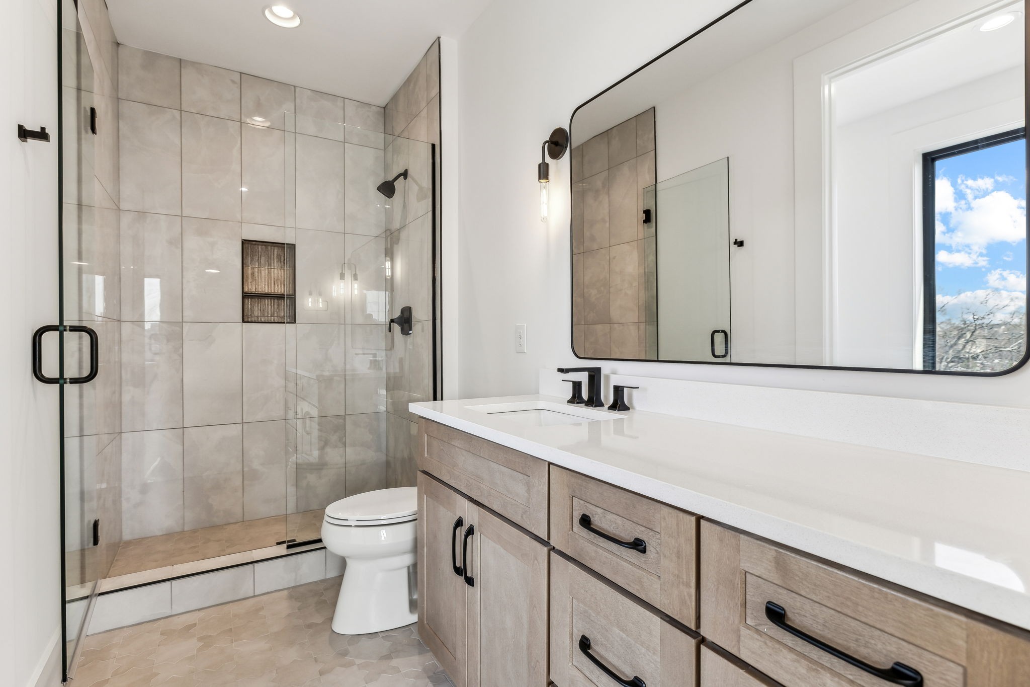 3135 Parthenon Avenue, Unit A Nashville, TN 37203 - Photo 38 of 77 a bathroom with a sink a toilet and shower