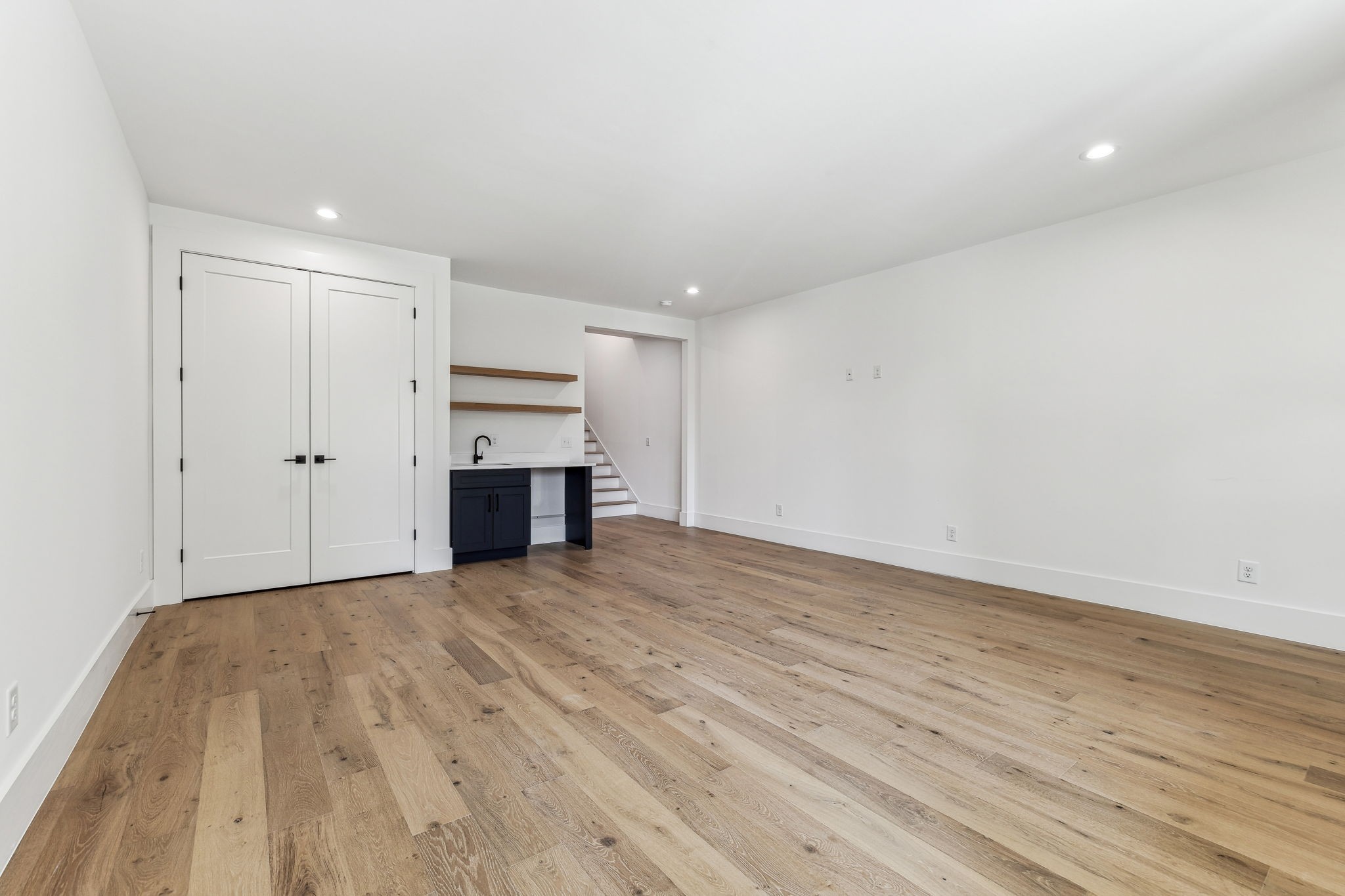 3135 Parthenon Avenue, Unit A Nashville, TN 37203 - Photo 43 of 77 a view of empty room with wooden floor and fireplace