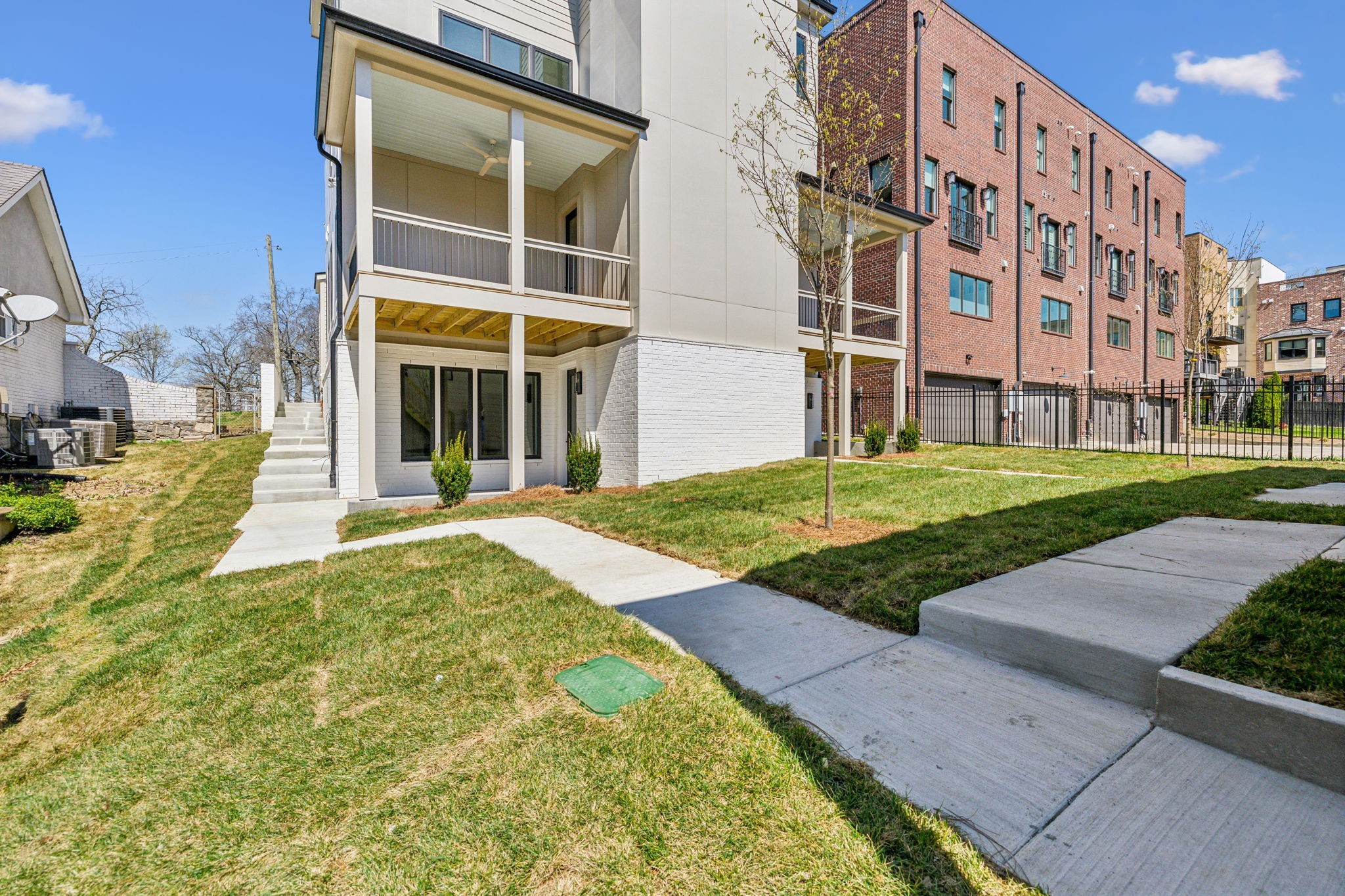 3135 Parthenon Avenue, Unit A Nashville, TN 37203 - Photo 52 of 77 a view of a building with a yard