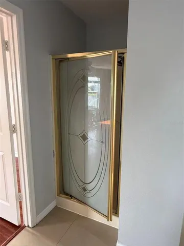 a utility room with mirror