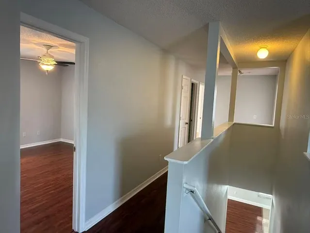 a view of a hallway with entryway