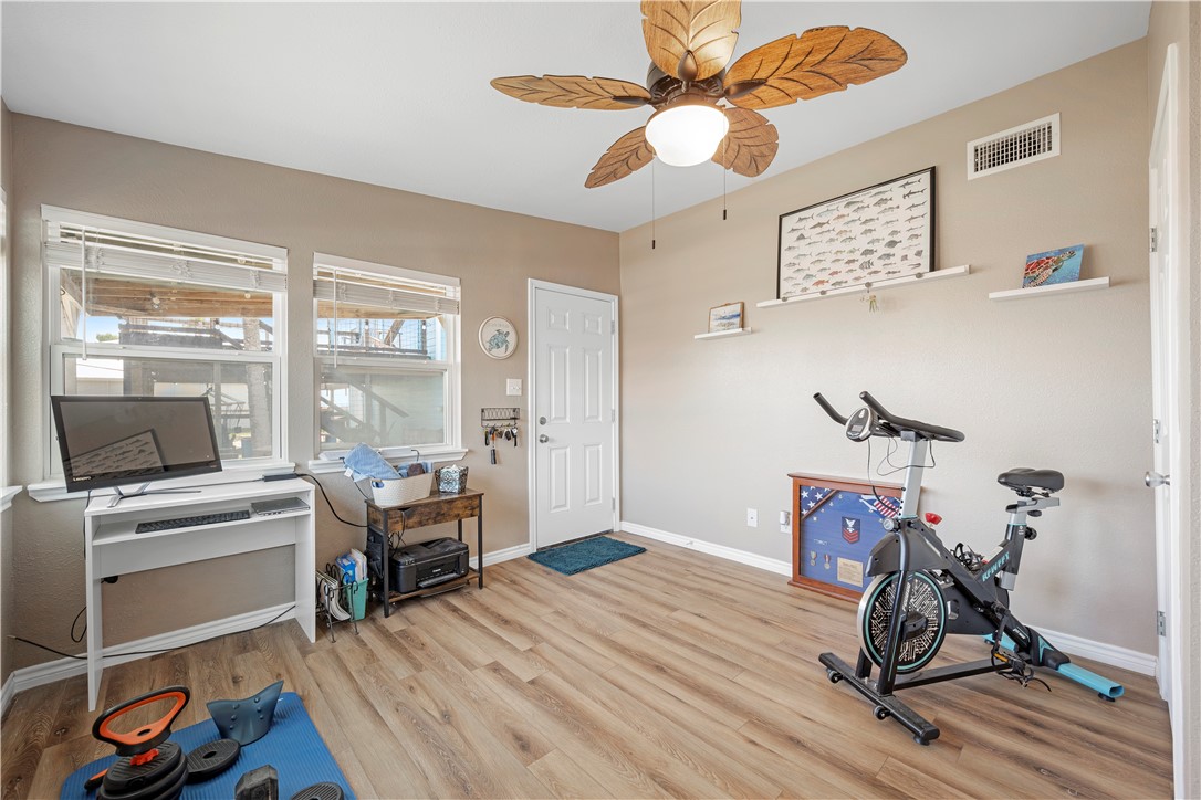 622 South Sandpiper Ingleside, TX 78362 - Photo 18 of 38 a view of a workspace with furniture and a window
