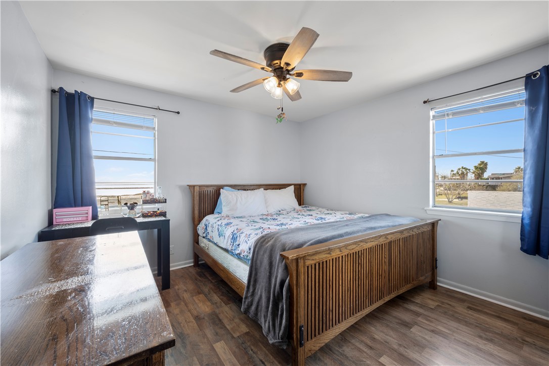 622 South Sandpiper Ingleside, TX 78362 - Photo 29 of 38 a bedroom with a large bed and a window