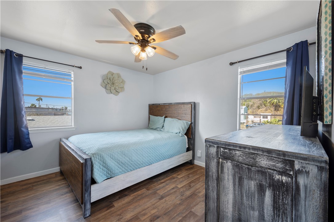 622 South Sandpiper Ingleside, TX 78362 - Photo 31 of 38 a bedroom with a bed and a window