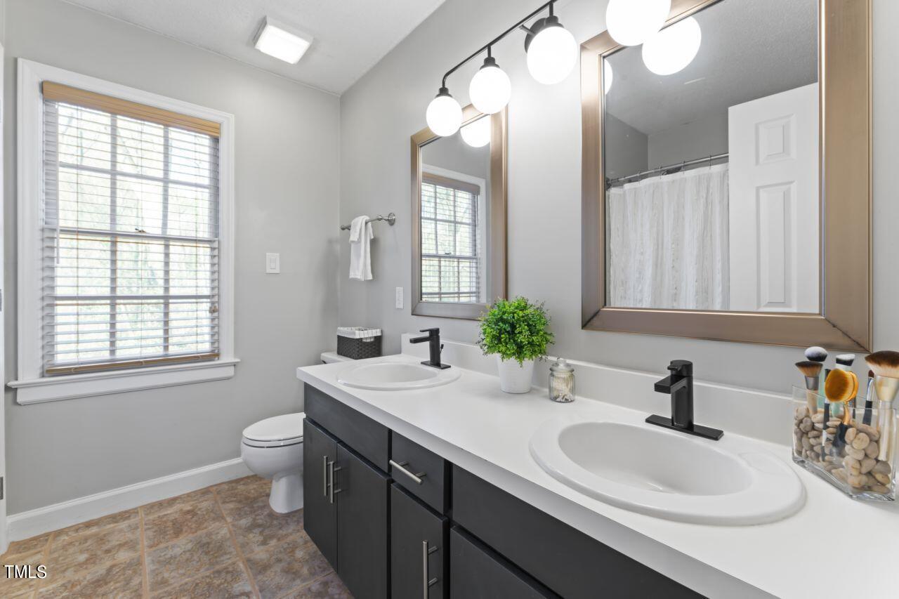 8808 Reigate Lane Raleigh, NC 27603 - Photo 15 of 39 Primary Bath