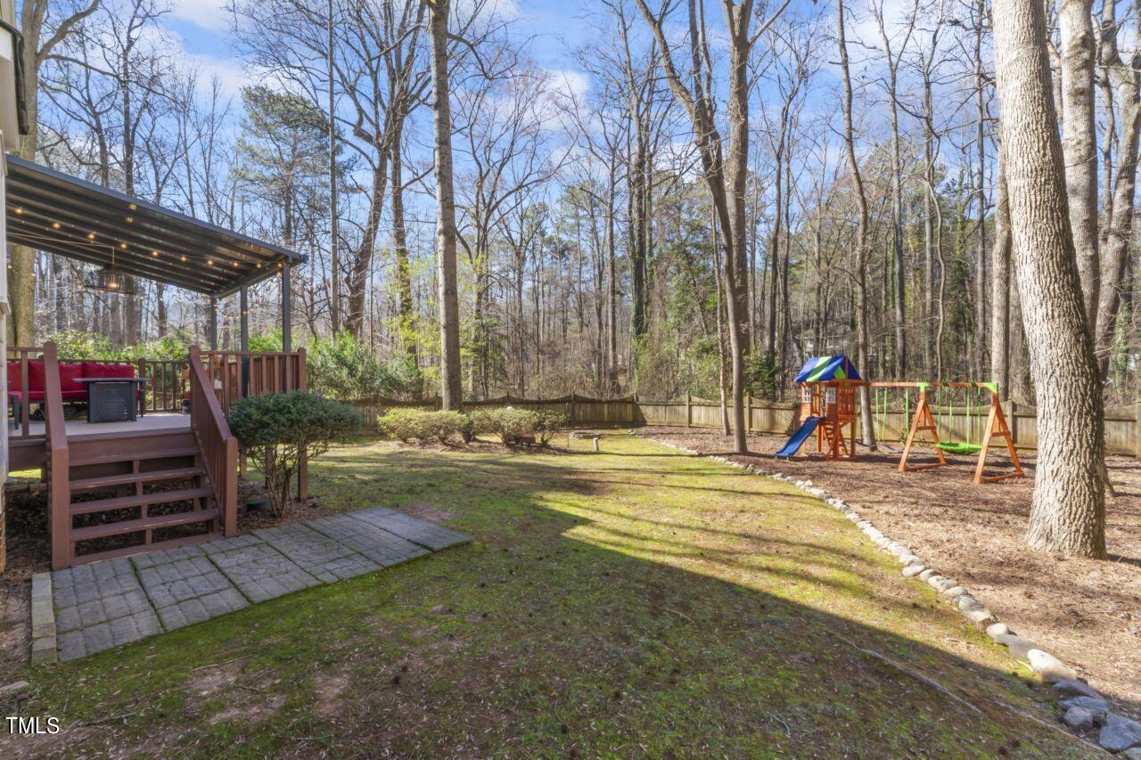 8808 Reigate Lane Raleigh, NC 27603 - Photo 22 of 39 Backyard deck