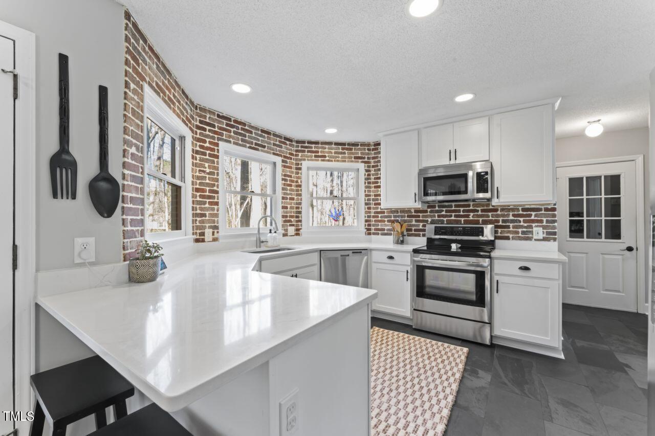 8808 Reigate Lane Raleigh, NC 27603 - Photo 3 of 39 Kitchen