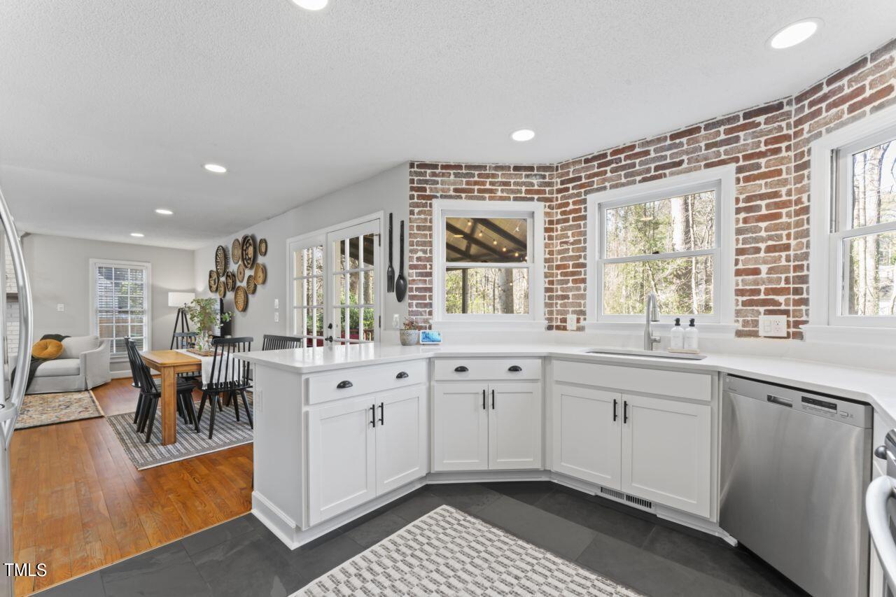 8808 Reigate Lane Raleigh, NC 27603 - Photo 4 of 39 Kitchen Dining Living