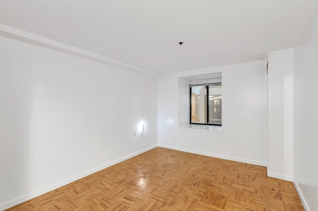 357 Commercial Street, Unit 219 Boston, MA 02109 - Photo 11 of 16 a view of an empty room